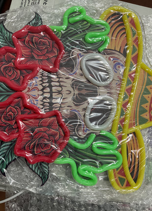 vibrant skull and rose neon sign